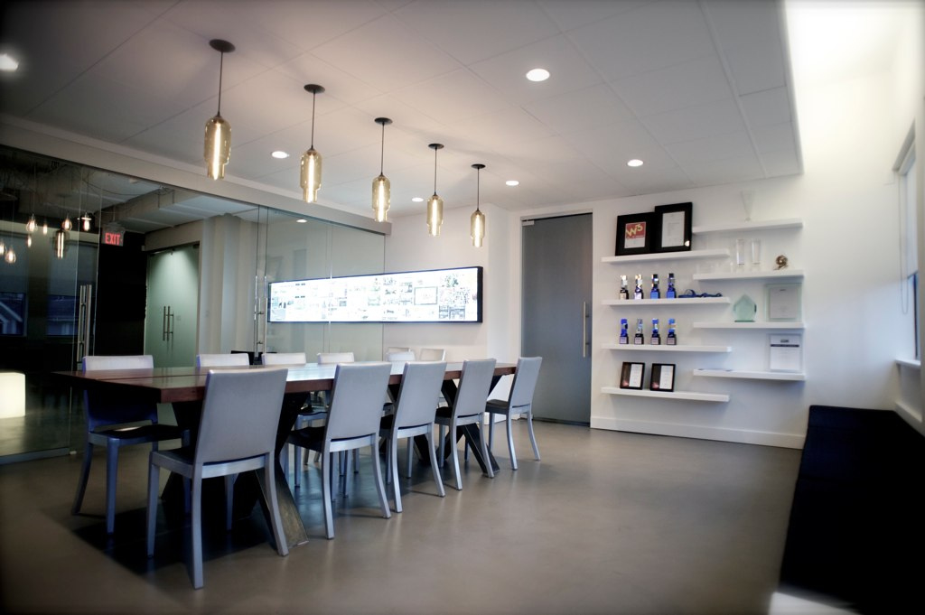 Pharos Modern Pendant Lights over a boardroom table