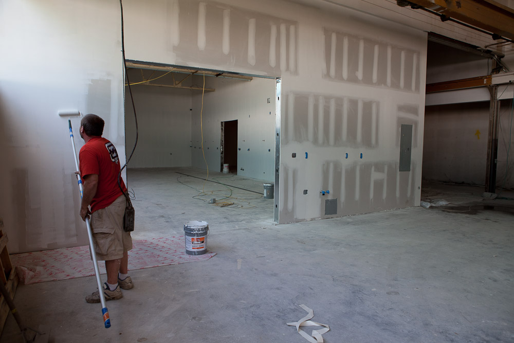 One of the HG Construction guys finishes the new paint job