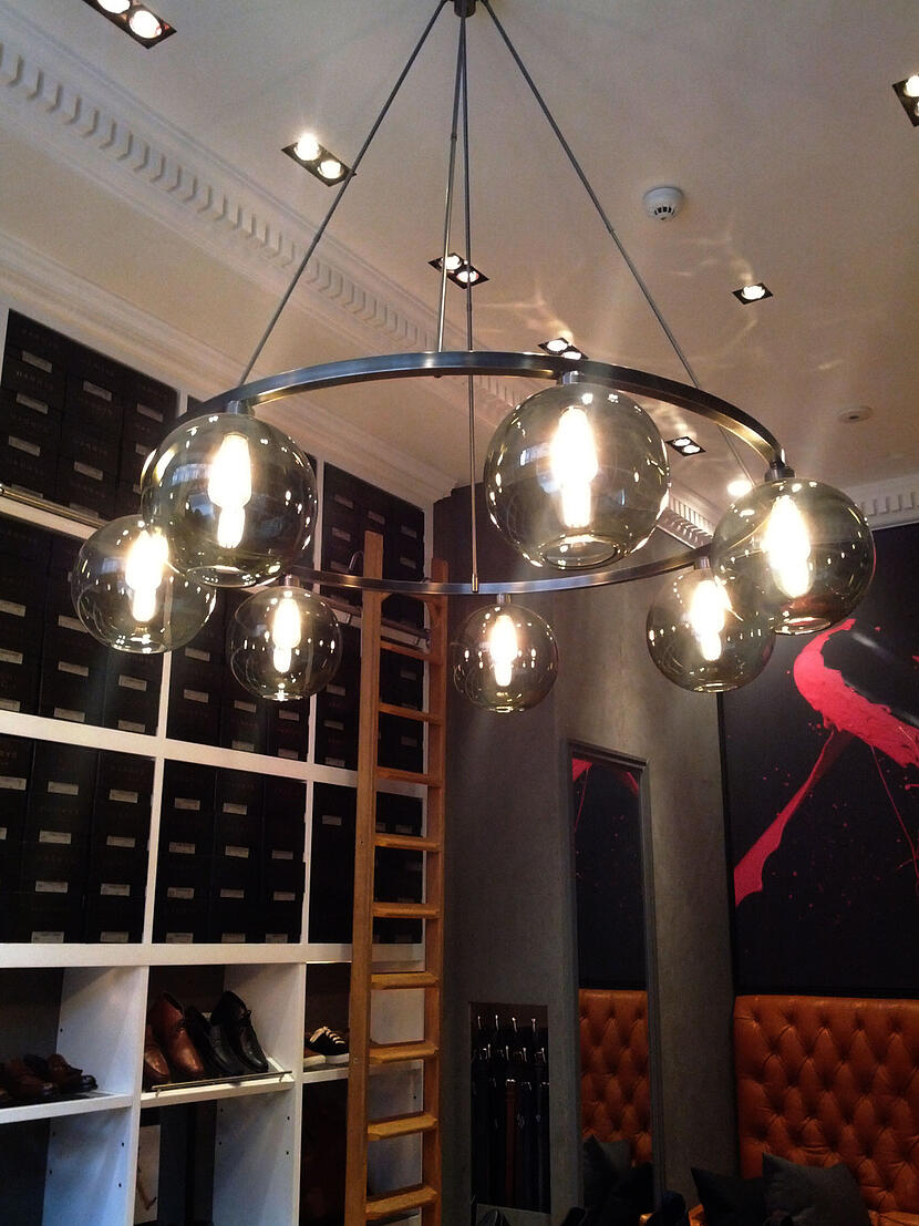 One of our Sola Modern Chandeliers featured at Harry's of London
