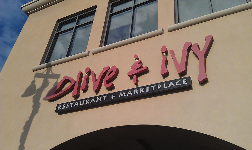 Olive & Ivy Restaurant in Arizona featuring Niche Modern Pharos Pendant Lighting