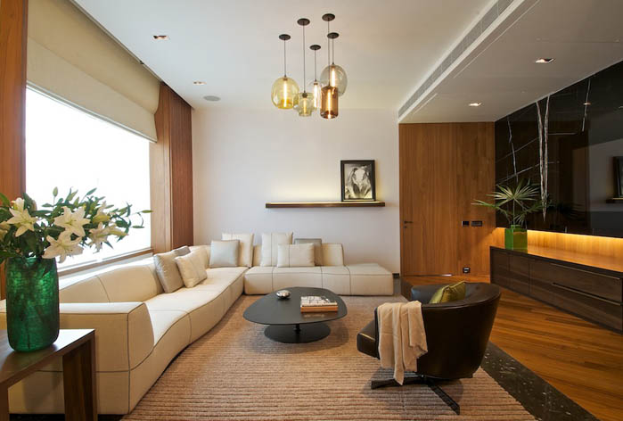 A Cluster of Niche Modern Pendant Lights in a Rajiv Saini & Associates Interior