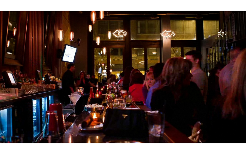 Epic Chicago featuring Niche Modern Pharos Lights above the Bar