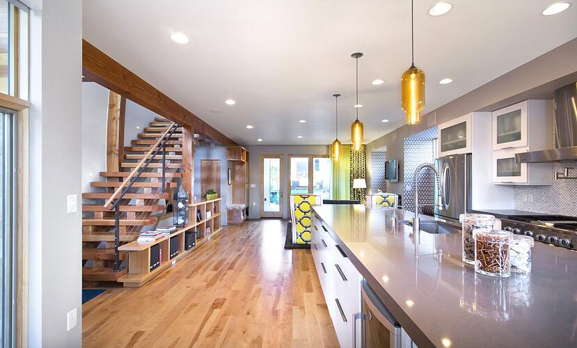 Niche Modern Pharos Pendant Lights over a Kitchen Island in Denver Shield House