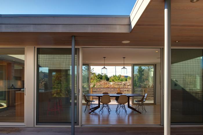 Bell Jar Pendants Hang in an Amagansett Home by Stelle Architects