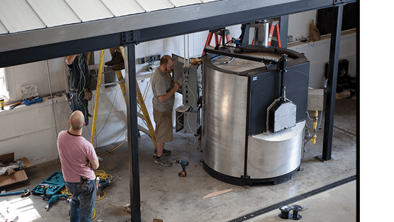 modern lighting company installs glassblowing equipment