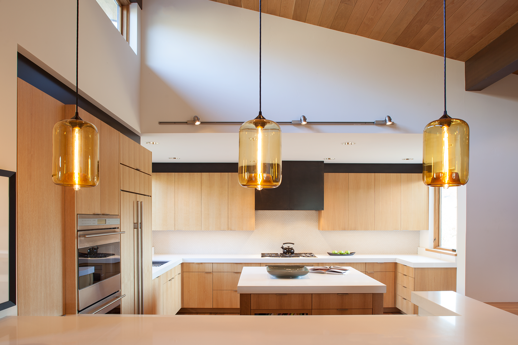Colored pendant lighting for store kitchen island