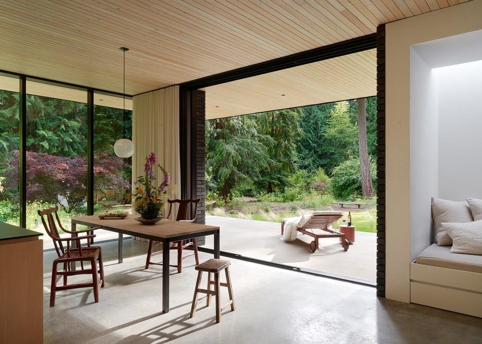 Modern glass pendant over dining table